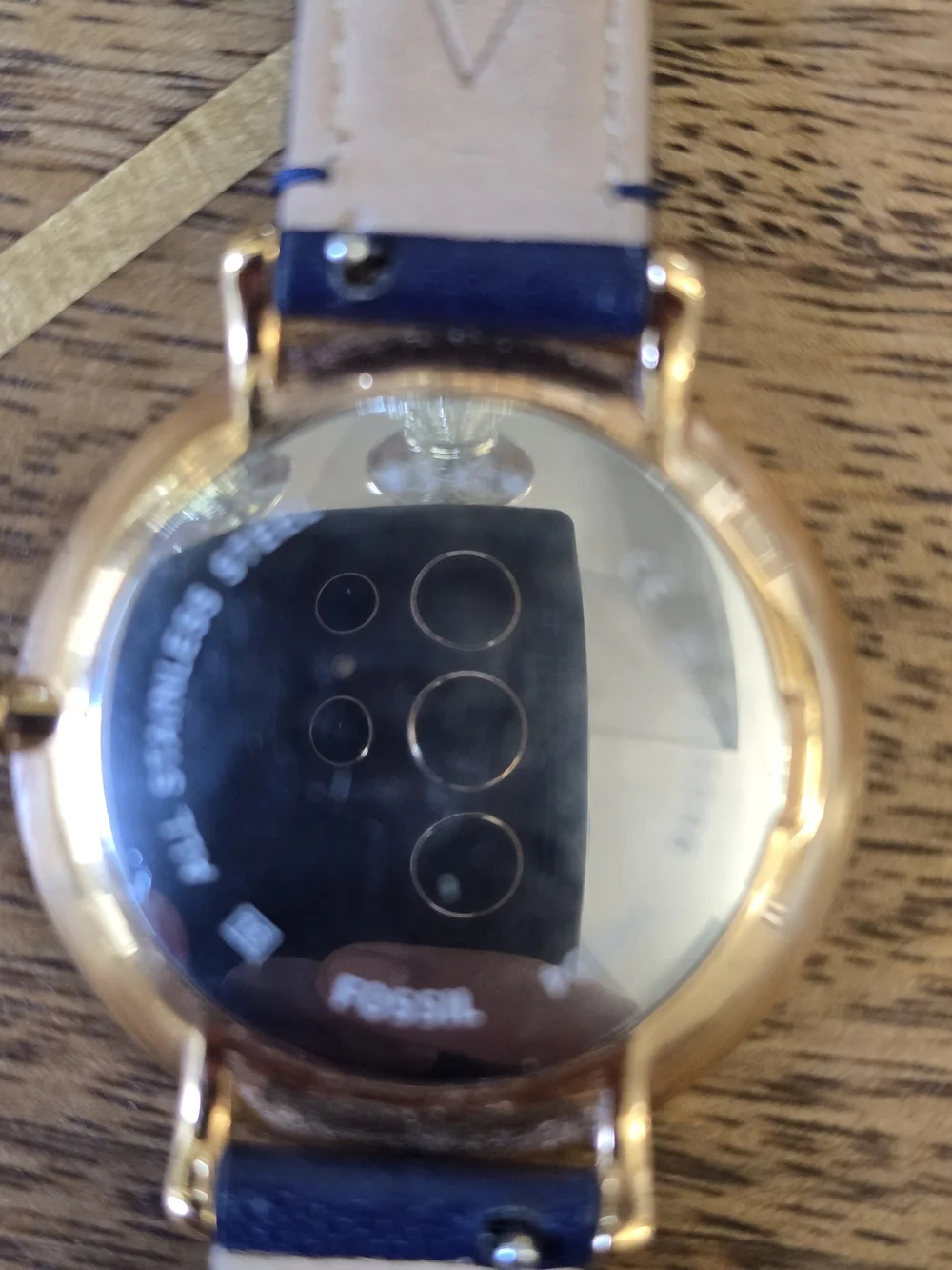 Fossil Gold-Tone Case Watch with White Dial and Black Leather Strap